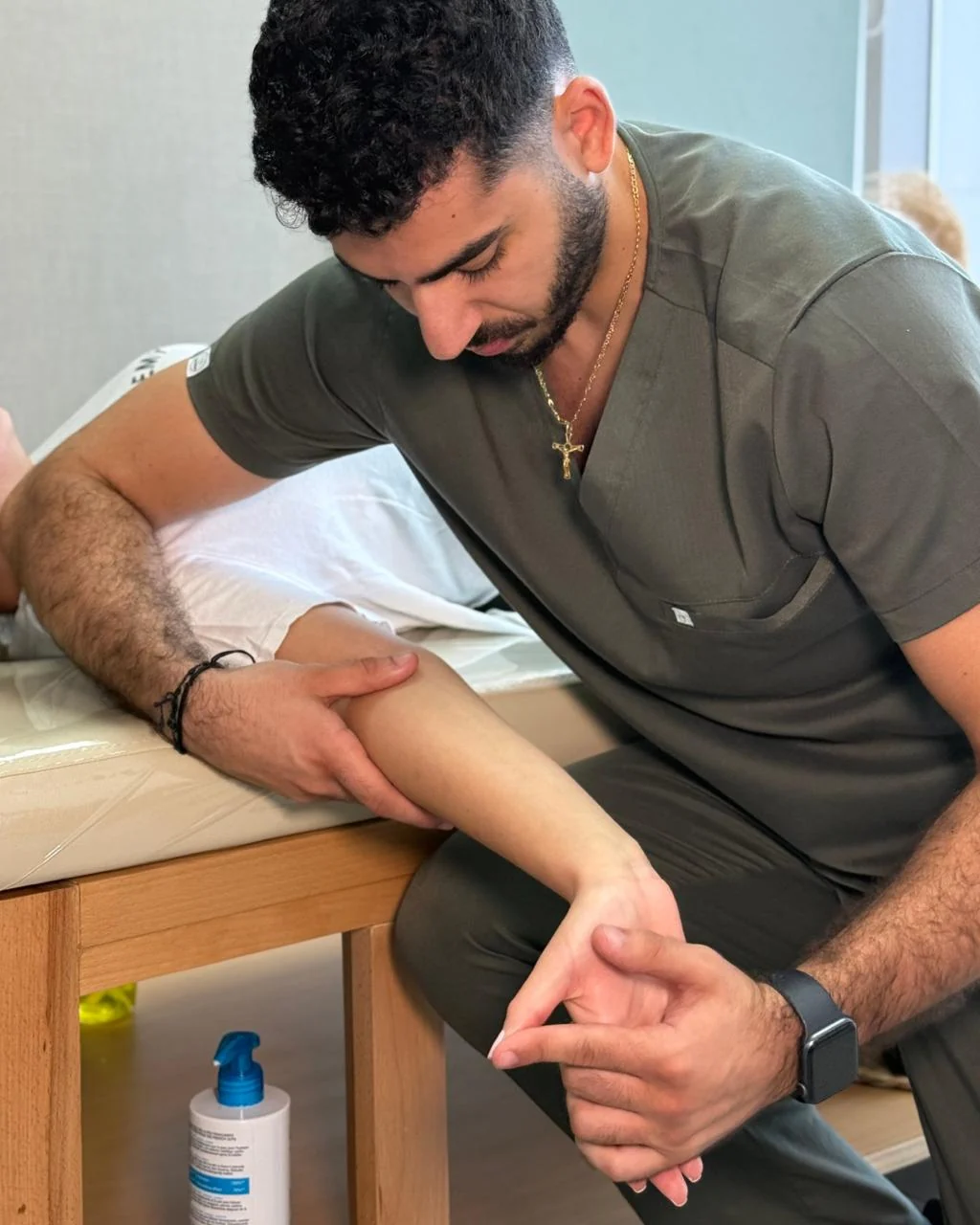 A therapist providing a hands-on treatment
